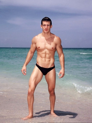 Gay male in Sexy Zack Johnathan shows off his body on the beach