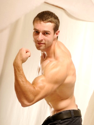XXX gay photos of Muscled boy shows his ass