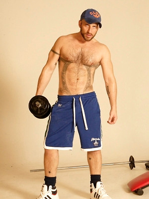 Gay sex pics with Strong hairy gay athlete Aitor Crash strips naked while lifting weights