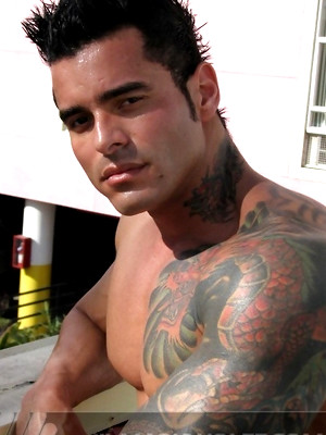 Free gay porn pics with Jock poses outside and jerks off on bed