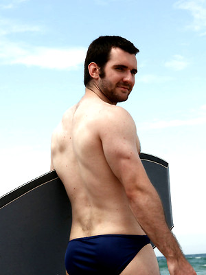 Gay sex pics with Hot australian hunk Josh on a beach