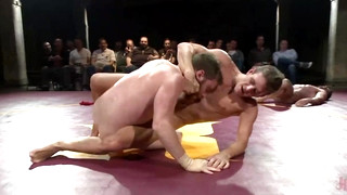 Free gay porn video Four hot studs fight for the right to fuck in front of a live crowd!