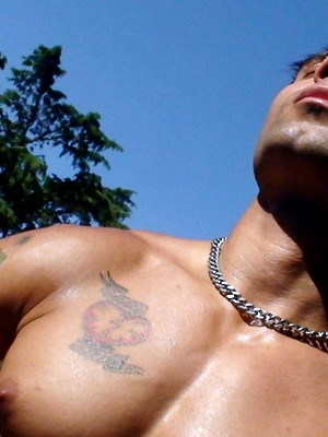 Gay sex pics with Leandro Silver jacking off outdoors