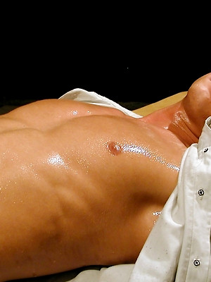 Free gay xxx pics with Hard bodied and oiled up Michael Davids busts a nut.