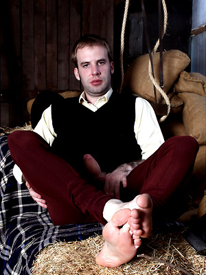 Gay porn pics Gay stud masturbating his hard cock inside a barn